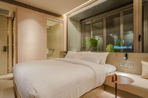 Ένα ή περισσότερα κρεβάτια σε δωμάτιο στο Inn a day