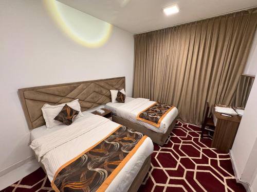 Postel nebo postele na pokoji v ubytování Star Suites