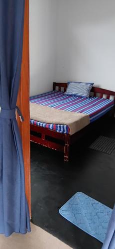 Postel nebo postele na pokoji v ubytování OBI home stay