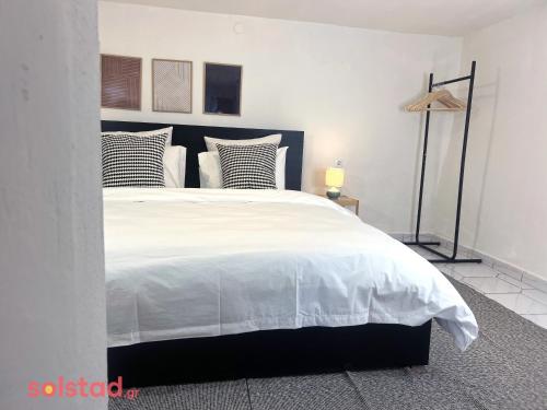 Postel nebo postele na pokoji v ubytování The Cheapest Flat in Town - By Solstad