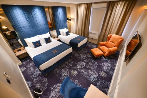Postel nebo postele na pokoji v ubytování Hotel Ideja