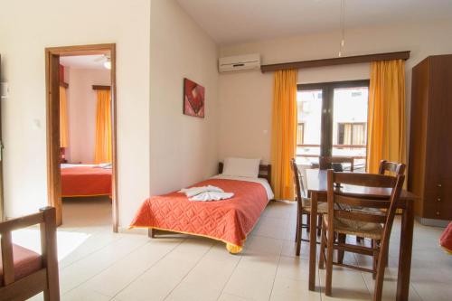 Ένα ή περισσότερα κρεβάτια σε δωμάτιο στο Lito Apartments Paleochora