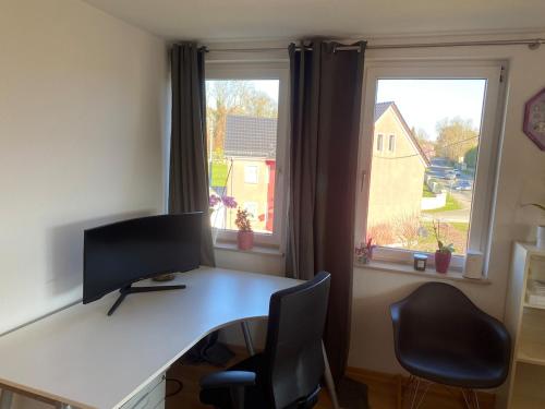 Μια τηλεόραση ή/και κέντρο ψυχαγωγίας στο Cozy studio apartment