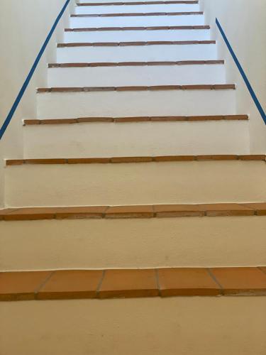 a set of stairs in a building at Lunavi in Forte dei Marmi