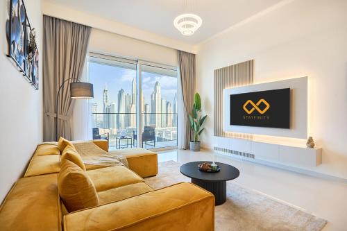 Luxury 2BR Apartment in Grand Bleu Tower at EMAAR Beachfront - High Floor with Marina and City View, Private Beach Access by Stayfinity