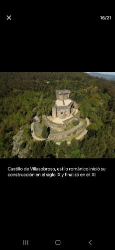 an aerial view of a building in a forest at El pisito de iker in Mondariz