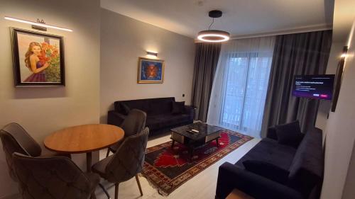 Телевизор и/или развлекательный центр в Orange Garden Aparts & Hotel THE NORDIC