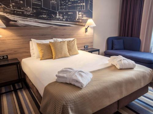 Posteľ alebo postele v izbe v ubytovaní Mercure Warszawa Centrum