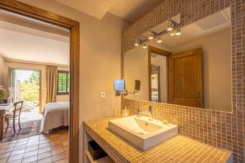 Ένα ή περισσότερα κρεβάτια σε δωμάτιο στο Auberge A Pignata