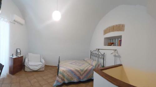 Posteľ alebo postele v izbe v ubytovaní L'antico Giardino