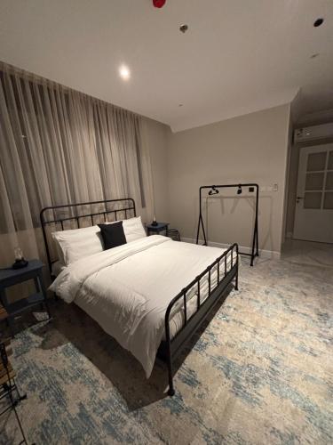 Katil atau katil-katil dalam bilik di Samo Apartment