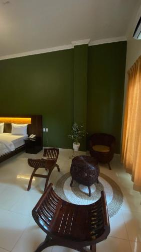 Hotel Ompu Hertiにあるベッド
