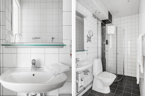 a white bathroom with a sink and a toilet at Sure Hotel by Best Western Ojaby Herrgard in Växjö