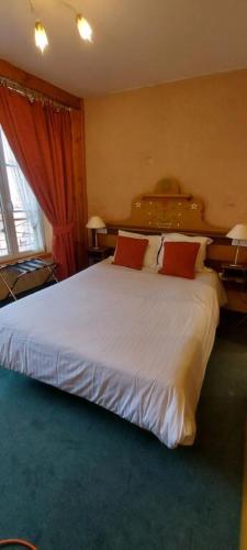Hotel Saint-Martinにあるベッド