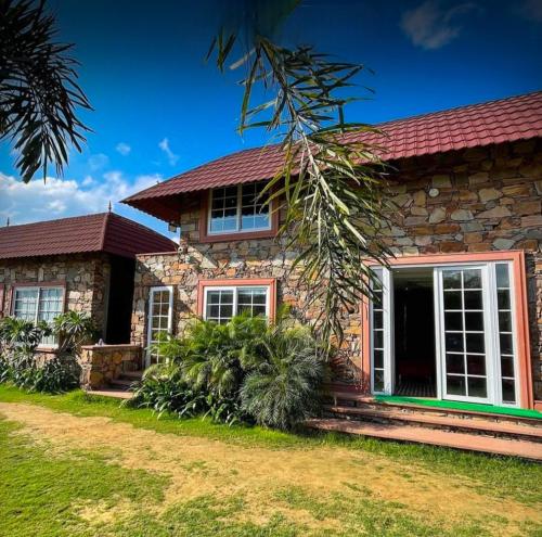 Κήπος έξω από το Atola Outhouse Resort