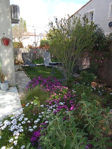 Taman di luar Maison dans une résidence de vacances