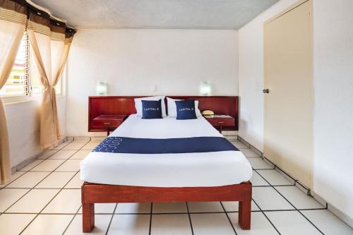 Cama o camas de una habitación en Capital O Colón, Ciudad Guzmán Jalisco