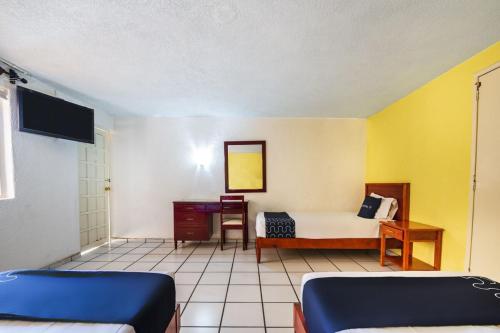 Cama o camas de una habitación en Capital O Colón, Ciudad Guzmán Jalisco
