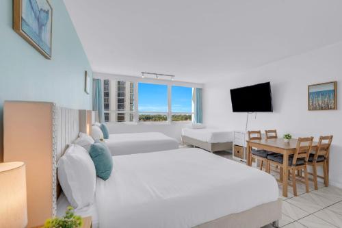 SeaStays Apartmentsにあるベッド