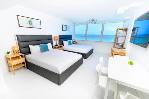 SeaStays Apartmentsにあるベッド