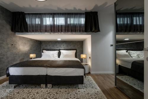 Posteľ alebo postele v izbe v ubytovaní Hotel - Teranea City Hvar