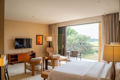 Et tv og/eller underholdning på VOGO Abu Dhabi Golf Resort & Spa Formerly The Westin Abu Dhabi Golf Resort & Spa