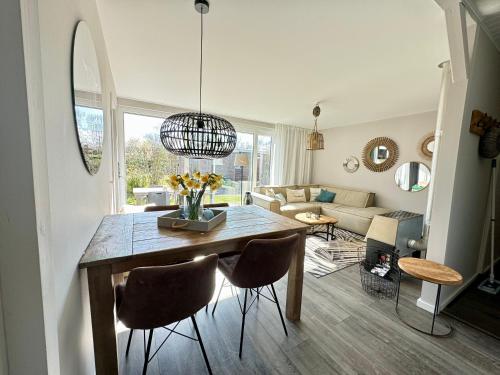 Et opholdsområde på freistehendes Ferienhaus an der Nordsee, Eureka 18 - Strandbude