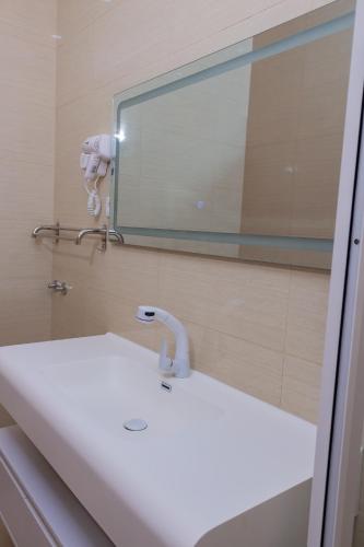 Ванная комната в Lily holiday hotel