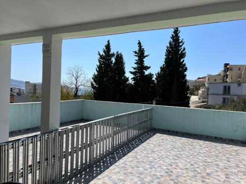 a balcony with a view of some trees at Green Villa in Bar, Susanj