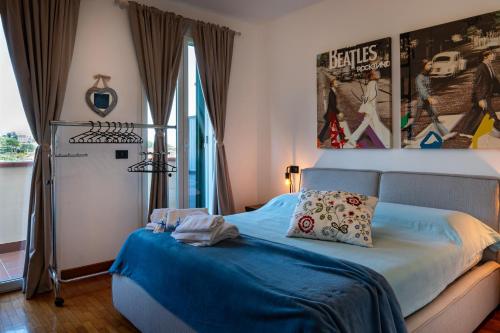 Postel nebo postele na pokoji v ubytování LUXURY APARTAMENT VISTA MARE garage e posto auto