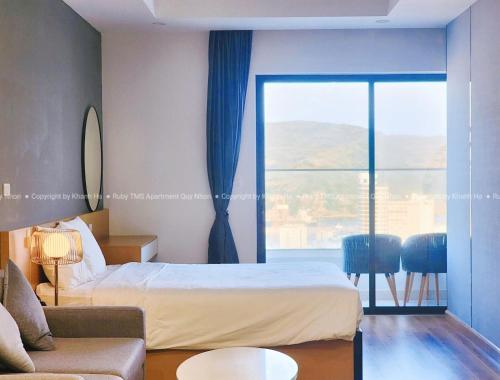 Postel nebo postele na pokoji v ubytování TMS Apartments Quy Nhơn
