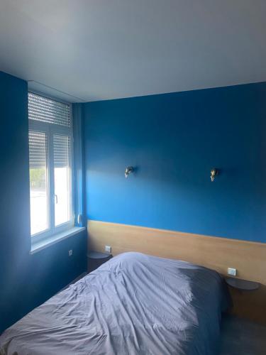 Postel nebo postele na pokoji v ubytování Le Trianon