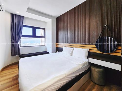 Postel nebo postele na pokoji v ubytování TMS Apartments Quy Nhơn