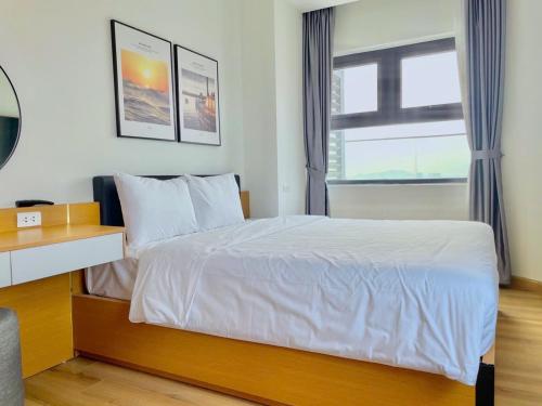 Postel nebo postele na pokoji v ubytování TMS Apartments Quy Nhơn