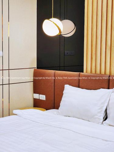 Postel nebo postele na pokoji v ubytování TMS Apartments Quy Nhơn