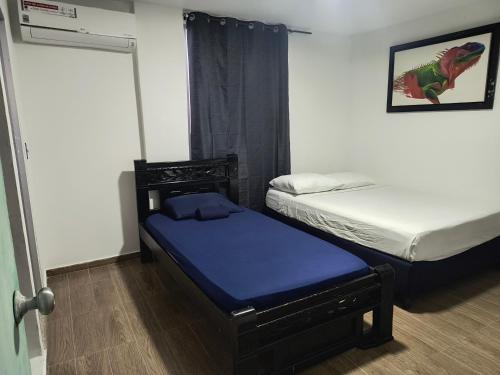 Ένα ή περισσότερα κρεβάτια σε δωμάτιο στο Apartamento Bahia Sonora