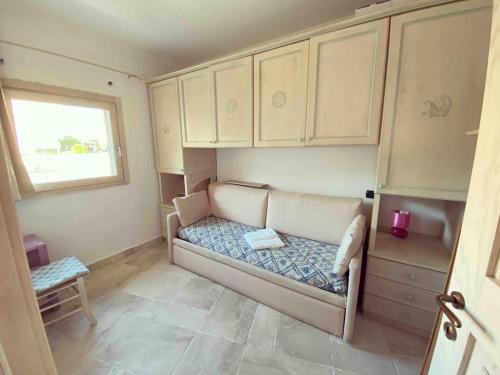 Khu vực ghế ngồi tại Casa Nina La Maddalena