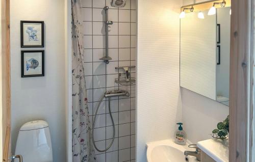 a bathroom with a shower and a sink at Bønnerup Strand in Glesborg