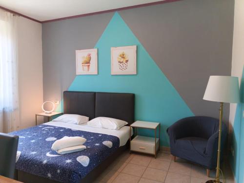 Postel nebo postele na pokoji v ubytování Villa Gelsomino Garden