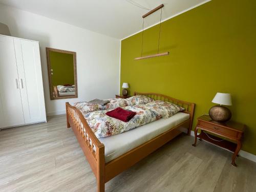 Ένα ή περισσότερα κρεβάτια σε δωμάτιο στο Ferienwohnung