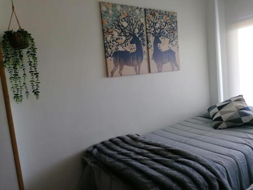 Postel nebo postele na pokoji v ubytování Panoràmic Vinaros