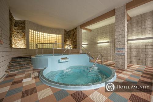 a jacuzzi tub in a building with at 203A Efficiency One Bath in Oakland