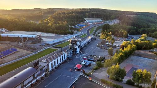 an aerial view of a building with a train station at Une Chambre à Foyr ? in Jalhay