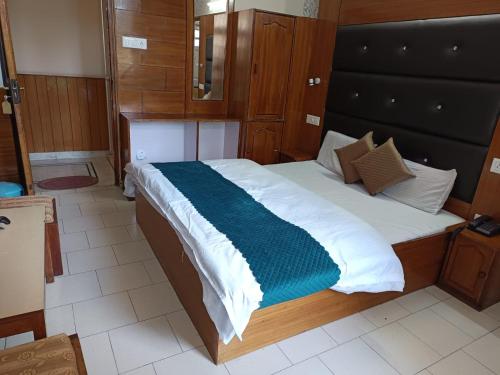 Katil atau katil-katil dalam bilik di Hotel Ashiana Regency