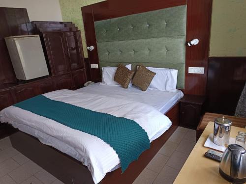 Katil atau katil-katil dalam bilik di Hotel Ashiana Regency