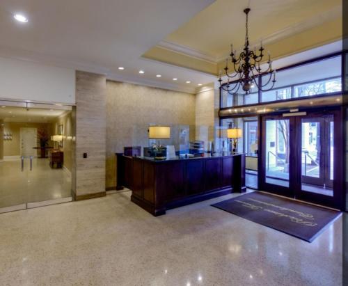 a lobby with a reception desk in a building at Star Oasis 1 Bedroom Condo Downtown Atlanta in Atlanta