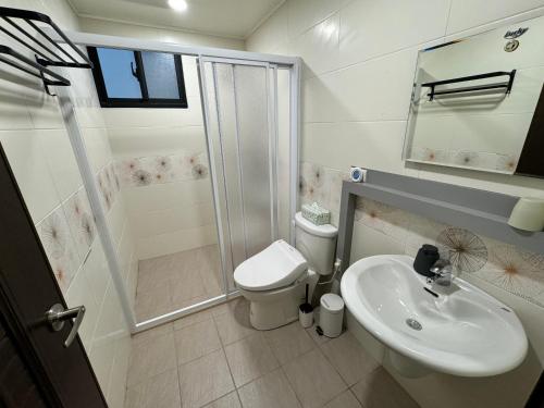 Koupelna v ubytování WinXin House