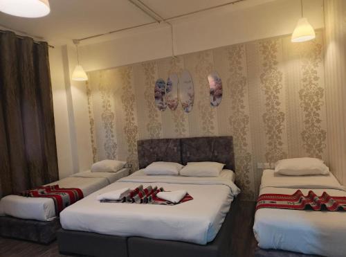 En eller flere senge i et værelse på Gate Inn