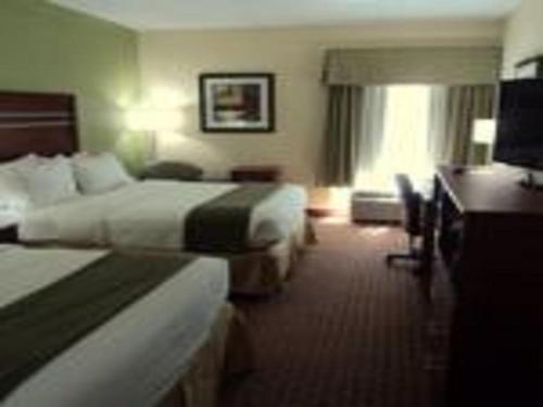 a hotel room with two beds and a desk at Holiday Inn Express Harrisburg SW - Mechanicsburg by IHG in Mechanicsburg