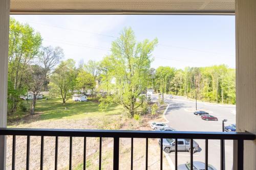 a balcony with a view of a parking lot at Allstar Luxury Home LLC in Durham